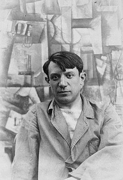 Picasso in front of his painting The Aficionado at Villa les Clochettes, summer 1912
